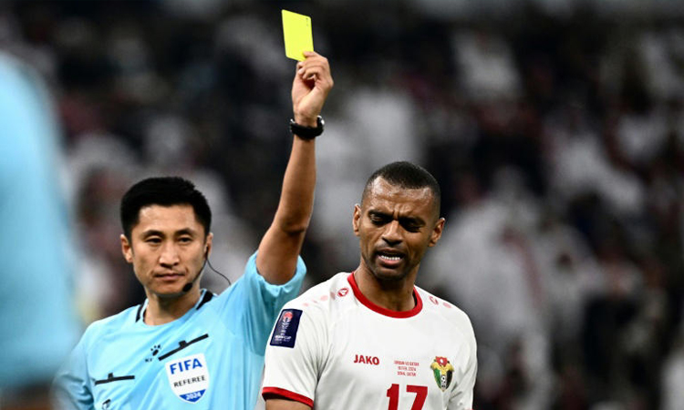 Success-starved China fans adopt 'Card Master' referee as World Cup rep