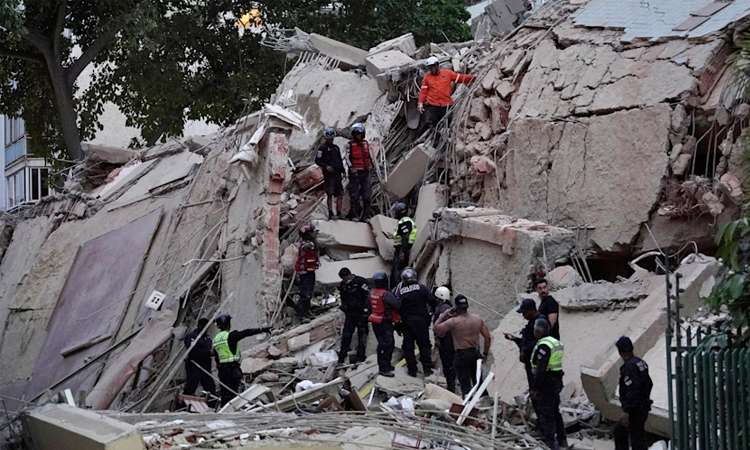 Venezuela twin quakes kill at least 164, topple buildings