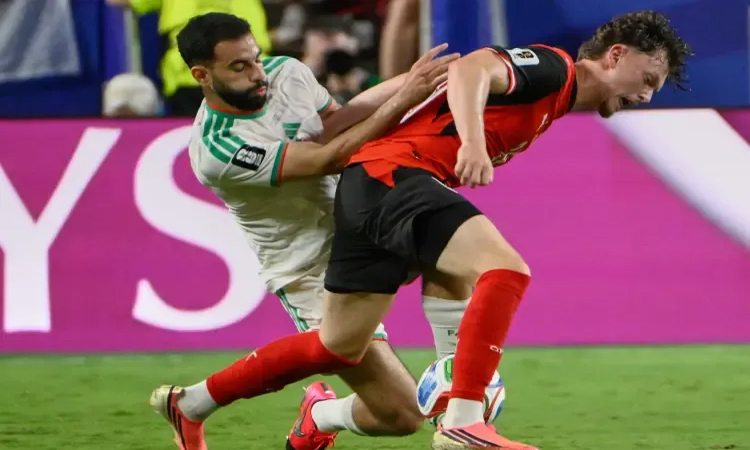 Algeria, Austria draw to advance in World Cup, Iran eliminated
