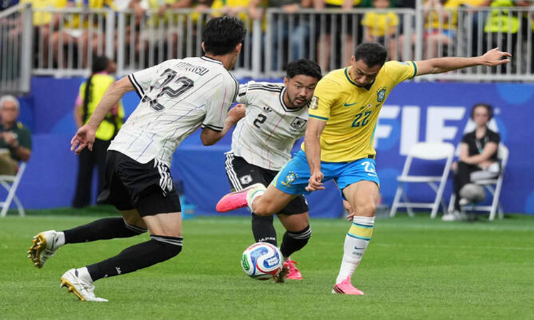Last-gasp Brazil down Japan to reach World Cup 16