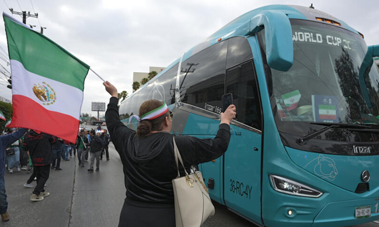 'Iran, Iran!' Iranian World Cup squad serenaded on return home