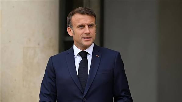 Syria says expecting visit by French President Macron