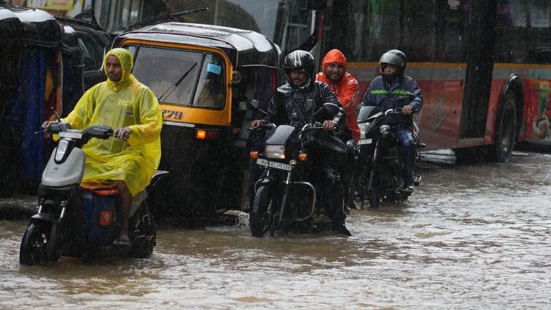 Building collapse kills six in Mumbai as torrential rain batters city