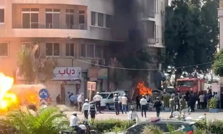 Explosions heard in Damascus during French president's visit: AFP