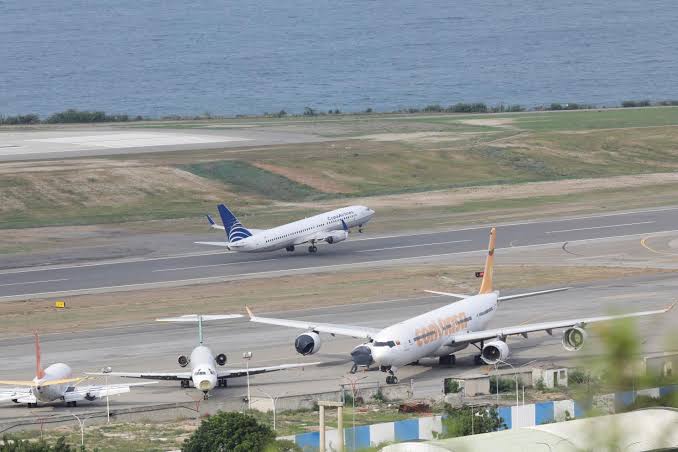 Venezuela says Caracas airport to reopen to commercial flights 'soon as  possible'