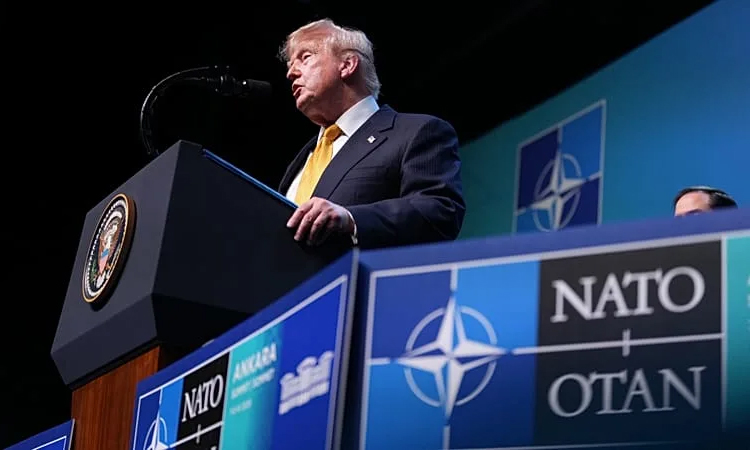 Trump tempers fury to end NATO summit on high note