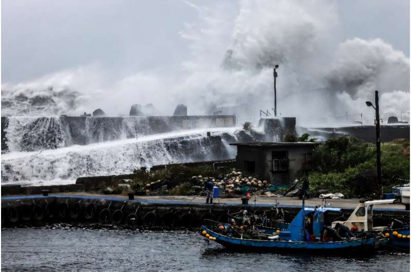 Thousands shelter in Taiwan as typhoon lashes Japan islands