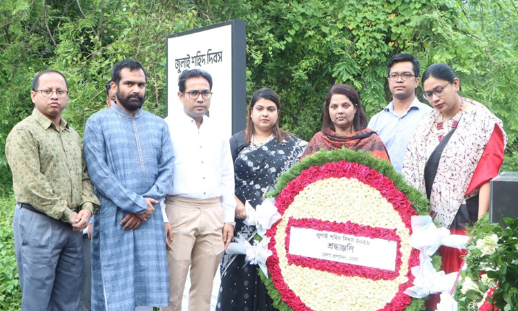 Dhaka district administration pays tribute at Rayerbazar July Martyrs mass grave