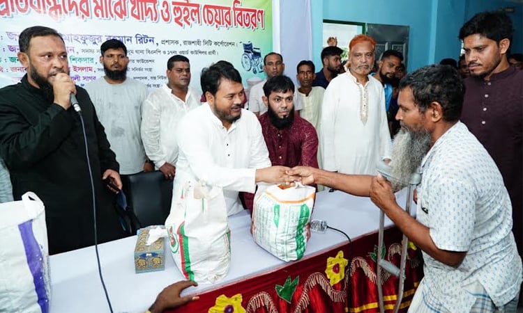 RCC administrator distributes food aid, wheelchairs