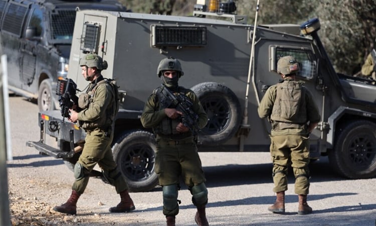 Army says Israeli killed two West Bank Palestinians behind stabbing