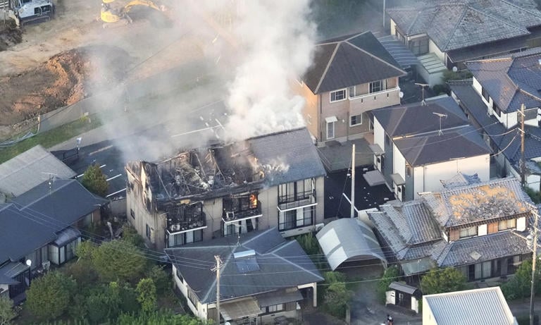 Rescuers search for survivors after powerful Japan quake kills 13