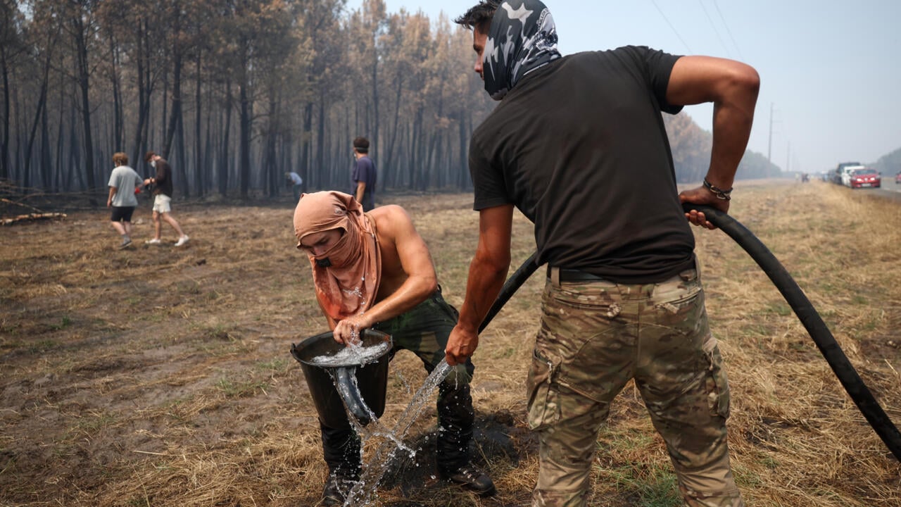 France firefighters hopeful, as Spain reports 'almost no flames'