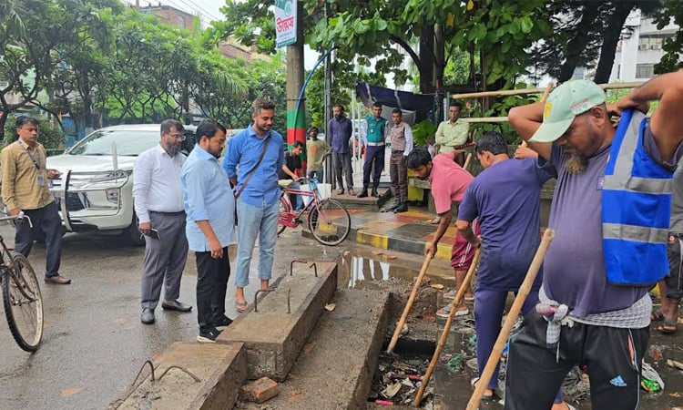 RCC administrator inspects drain cleaning activities