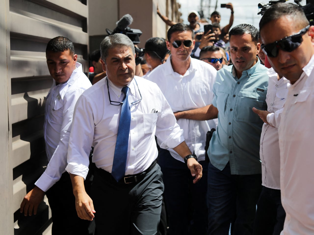 Honduran ex-leader pardoned by Trump to remain free amid corruption trial