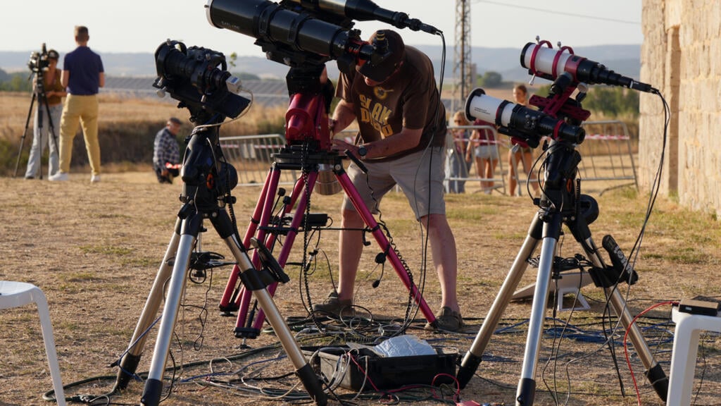 Skywatchers gather in Europe to see total solar eclipse