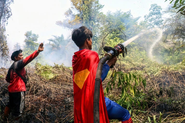 'Keep up the spirit': Indonesian teenage 'Superman' joins wildfire fight