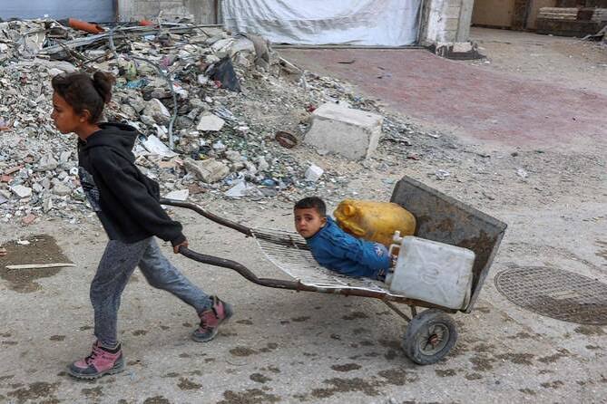 Gaza rescuers say Israeli strikes kill three, including a child
