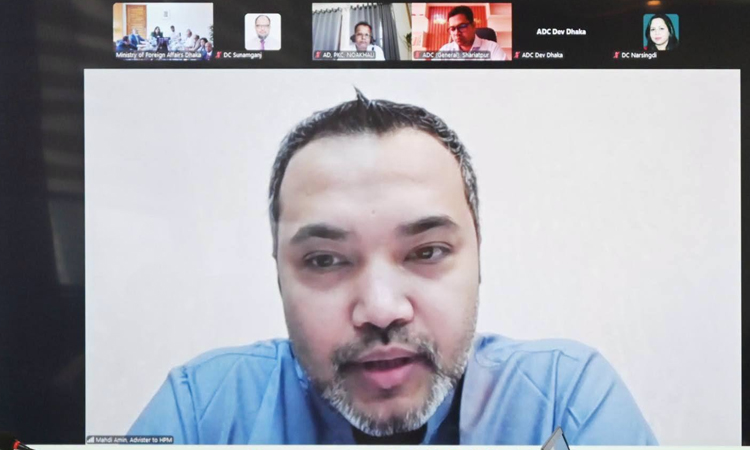 Adviser to the Ministry of Expatriates' Welfare and Overseas Employment Mahdi Amin joined the meeting virtually. Photo : Ministry
