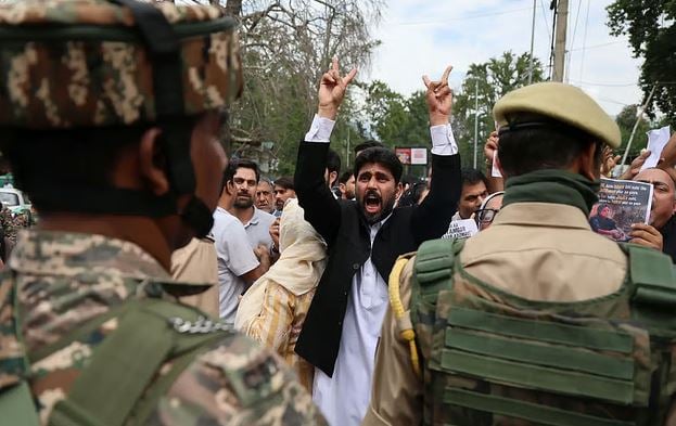 India police clash with protestors over jobs and exam transparency