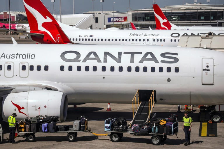 Qantas says profits slump as fuel costs surge