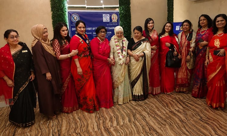 Sharing hearts: Inner Wheel Agradut members stand beside Dhaka's underprivileged women