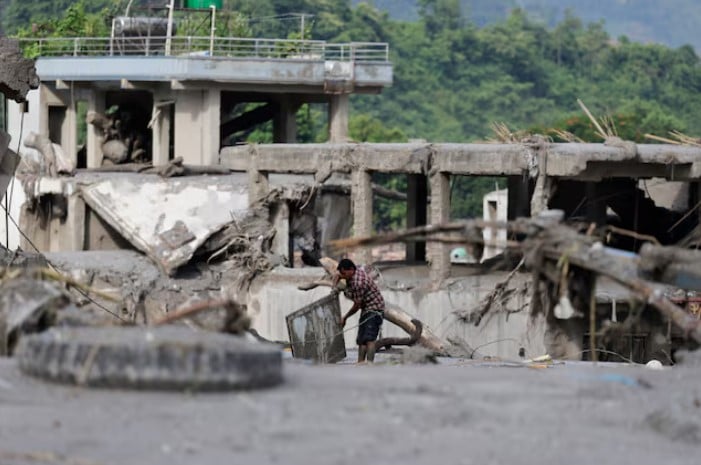 China warns of high flood risk from lake formed by mudslide: state media