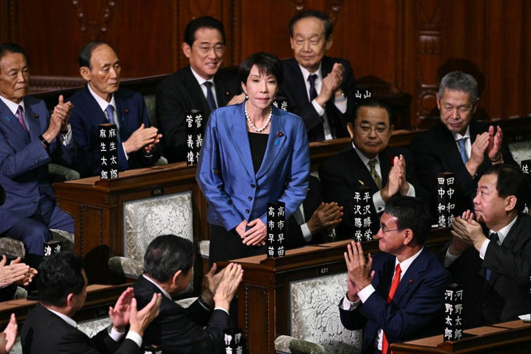 Japan to relax overtime regulation under workaholic PM