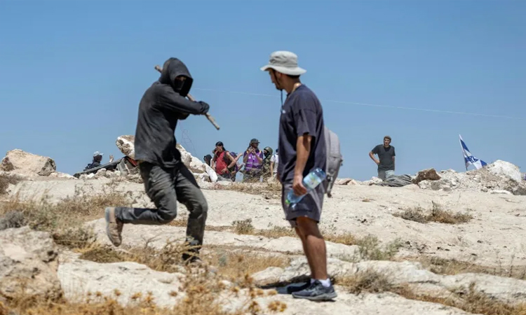 Driven by faith, activists stand up to fellow Jews to protect Palestinians