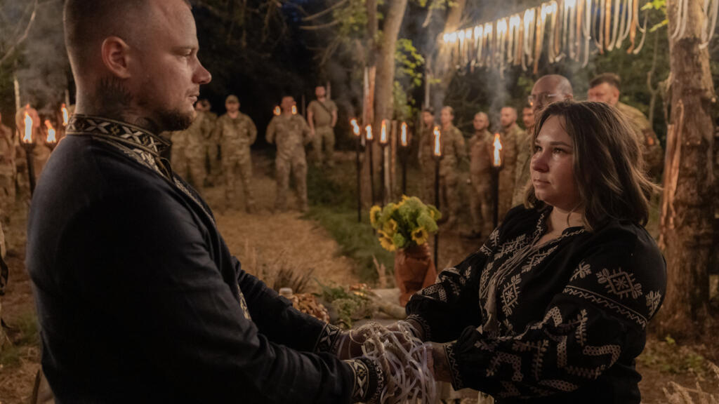 Amid war, Ukrainian soldiers celebrate love at ritual wedding