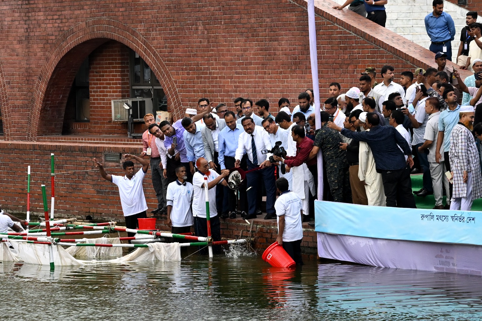 Speaker releases fish fingerlings into Sangsad Bhaban lake