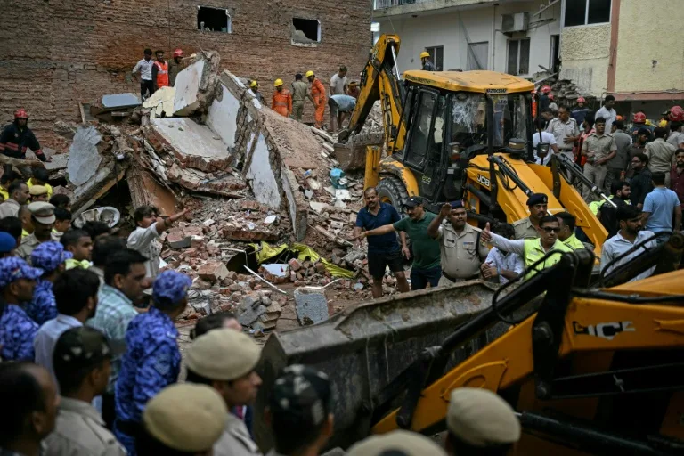 India teams search for trapped after deadly Delhi building collapse