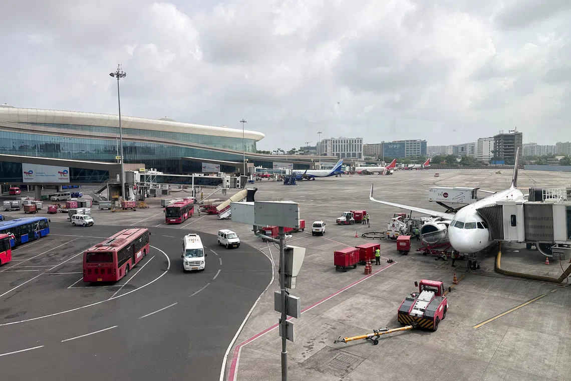 Adani airport business to raise $1 billion through stake sale