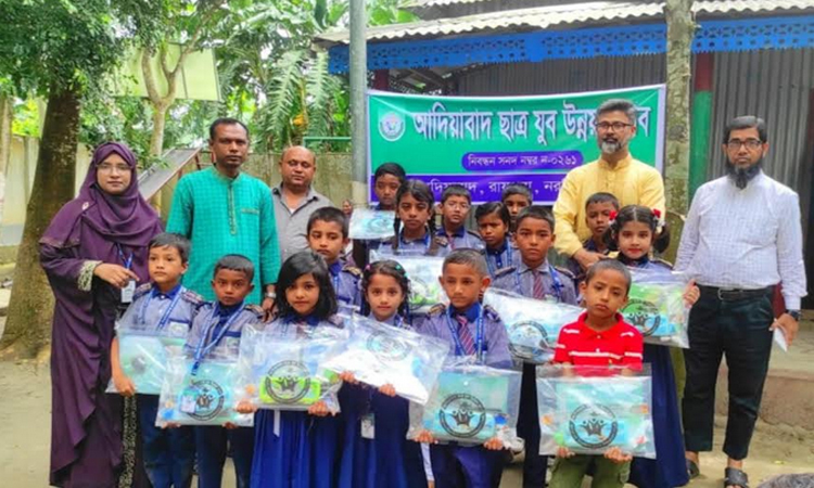 নরসিংদীতে বৃক্ষরোপণ ও শিক্ষা উপকরণ বিতরণ