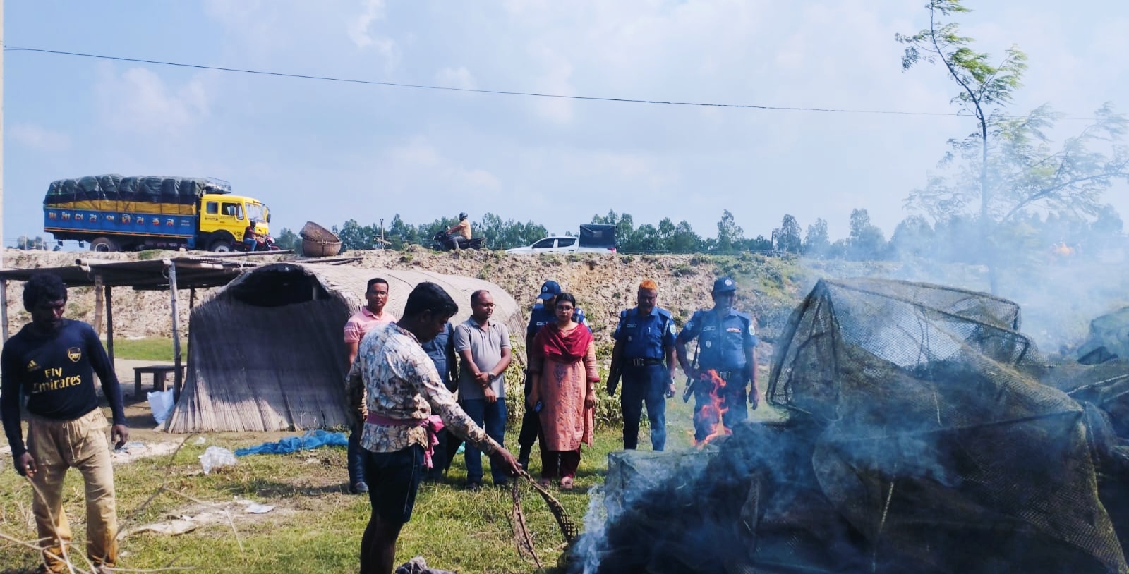 নাটোরে চলনবিলে জব্দকৃত অবৈধ জাল ধ্বংস